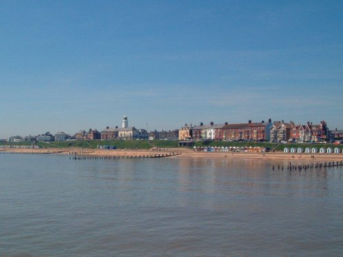 Southwold seafront and the iconic lighthouse, viewed from Southwold pier